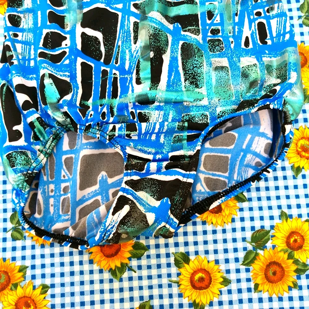 Source Unknown girls swimsuit
